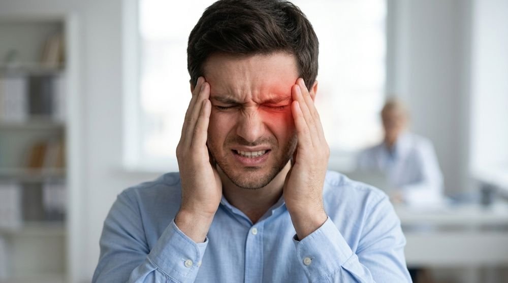 Headache behind eyes